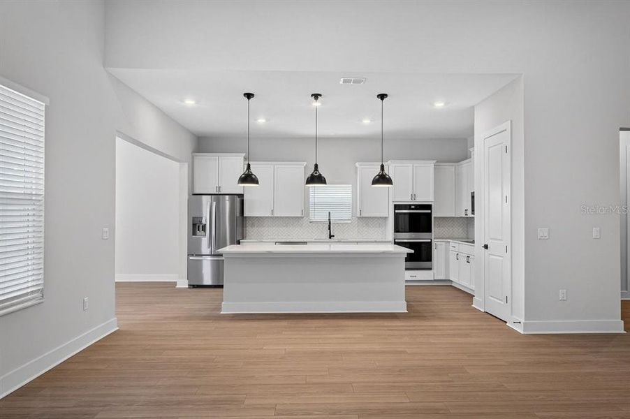 Furnished interior view inside a new home in Stables at Cary Forest, Bryceville (Image 6).