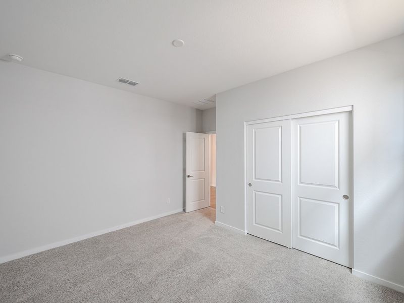 A room with white doors.