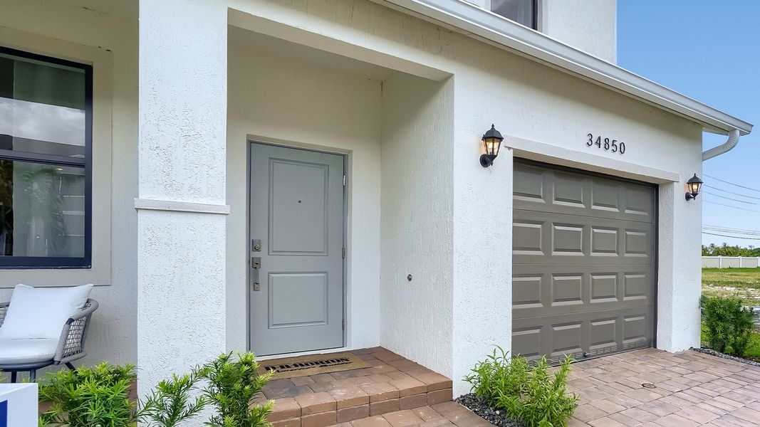 Representative exterior details of a home built from the Sapole II by D.R. Horton in Juniper Cove, Homestead (Image 3).