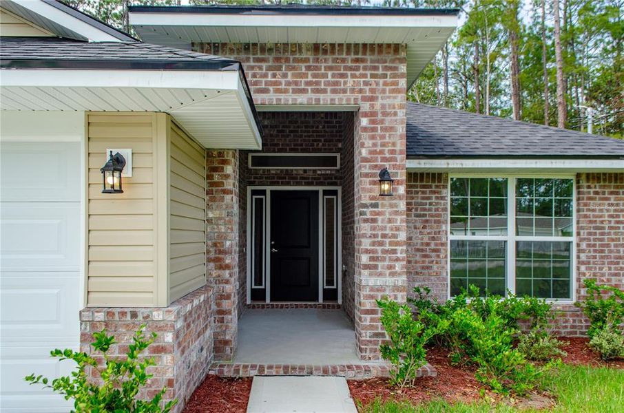 Exterior details and patio area of a home in , Palm Coast (Image 3). Exterior details and patio area of a home in , Palm Coast (Image 3).