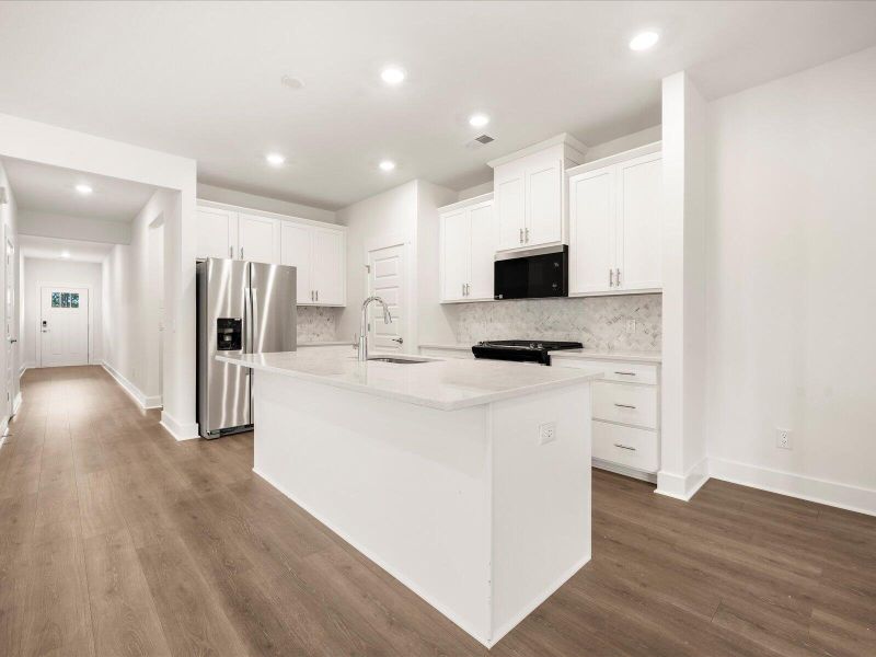 Furnished interior view inside a new home in The Coves at Lakes of Cane Bay, Summerville (Image 7).