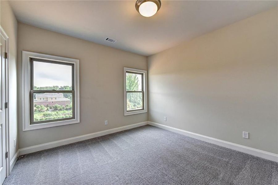 Spacious, unfurnished interior of a new home in Bellmoore Park, Duluth (Image 22).