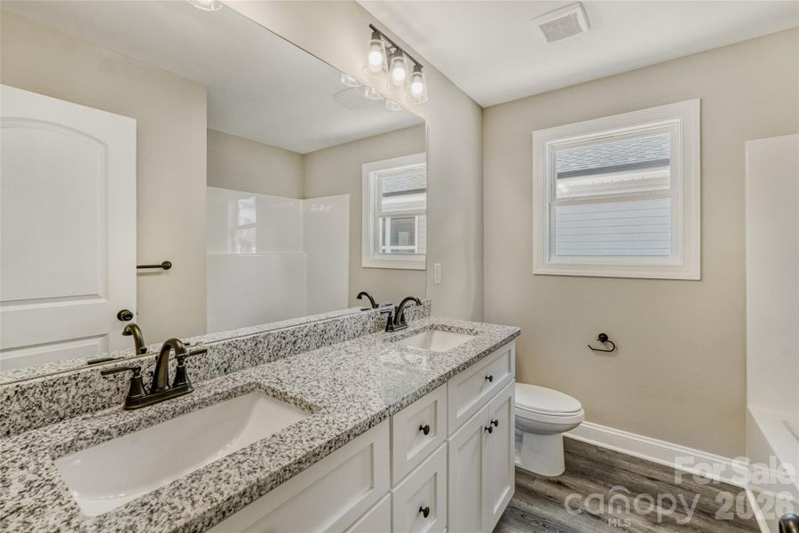 Dual vanities in the primary bath Dual vanities in the primary bath