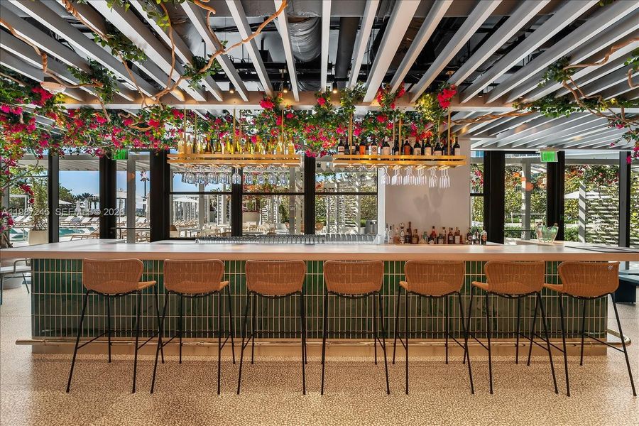 Bar Area in the Indoor Portion of the poolside restaurant curated by James Beard Award-winning Chef Michelle Bernstein at Five Park Miami Beach. Bar Area in the Indoor Portion of the poolside restaurant curated by James Beard Award-winning Chef Michelle Bernstein at Five Park Miami Beach.