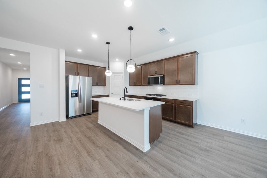 Furnished interior view inside a new home in The Villages of Hurricane Creek, Anna (Image 6).