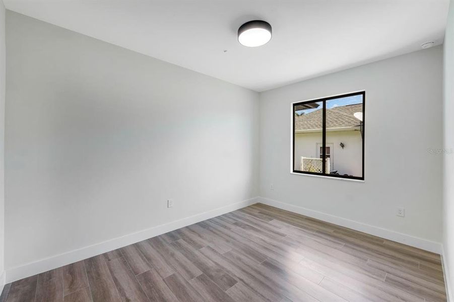 Spacious, unfurnished interior of a new home in , Port Charlotte (Image 13).