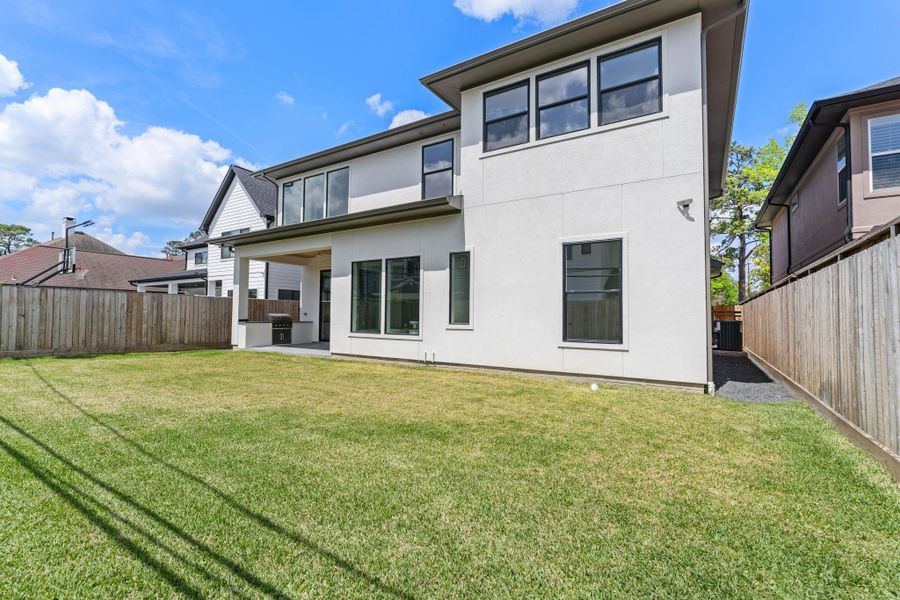 Exterior details and patio area of a home in , Houston (Image 3).
