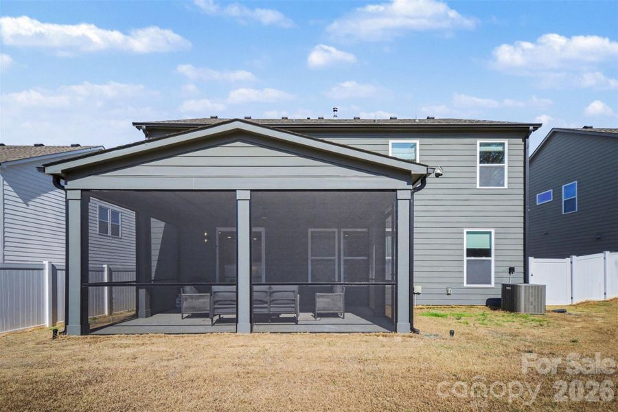Exterior details and patio area of a home in Enclave at Caldwell, Charlotte (Image 27).