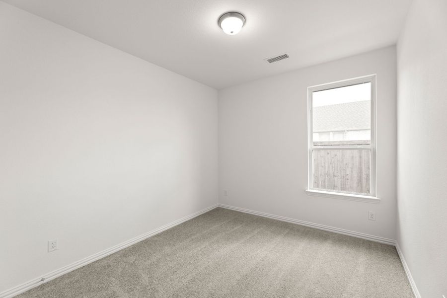Representative unfurnished interior of a home built from the Blackburn by UnionMain Homes in Reunion, Rhome (Image 13).