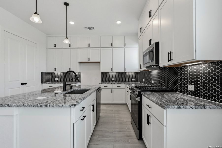 Furnished interior view inside a new home in Rose Hill, San Antonio (Image 15).