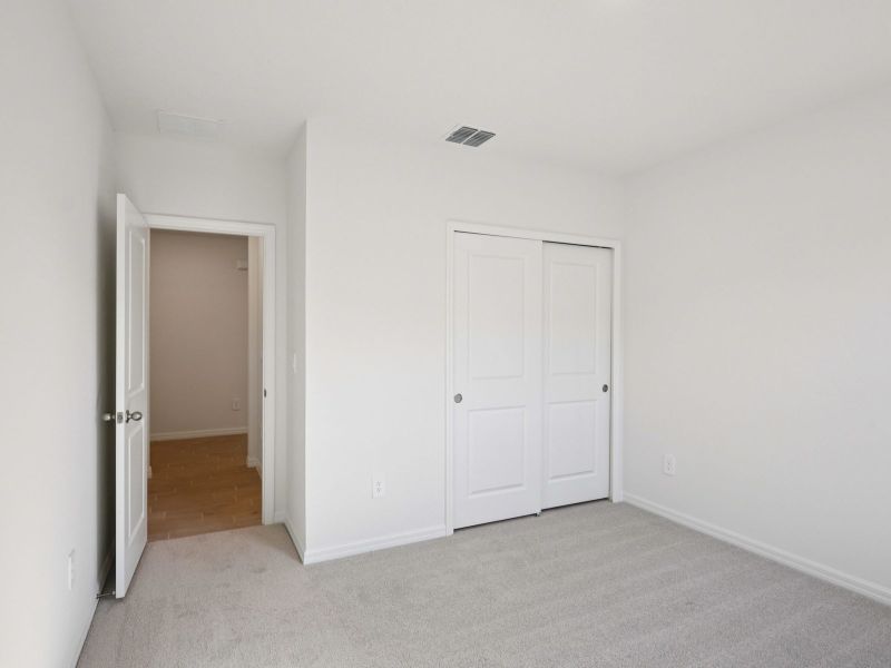 Spacious, unfurnished interior of a new home in Leyland Preserve - Classic Series, Brooksville (Image 14).