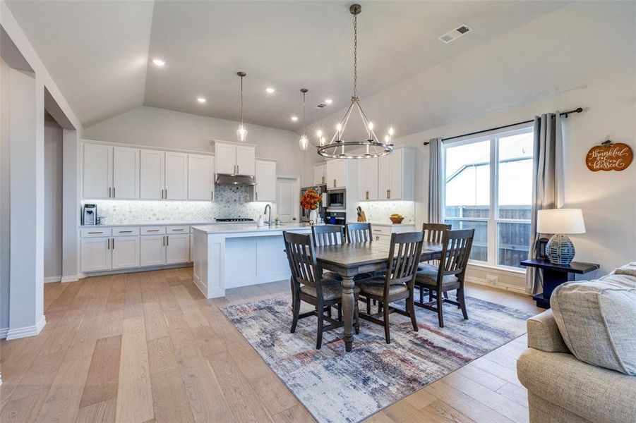 Open concept layout kitchen and dining area