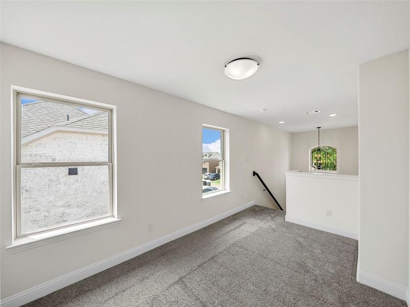 Empty room with carpet flooring