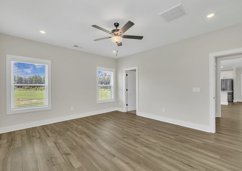 Windows let in light to each bedroom.