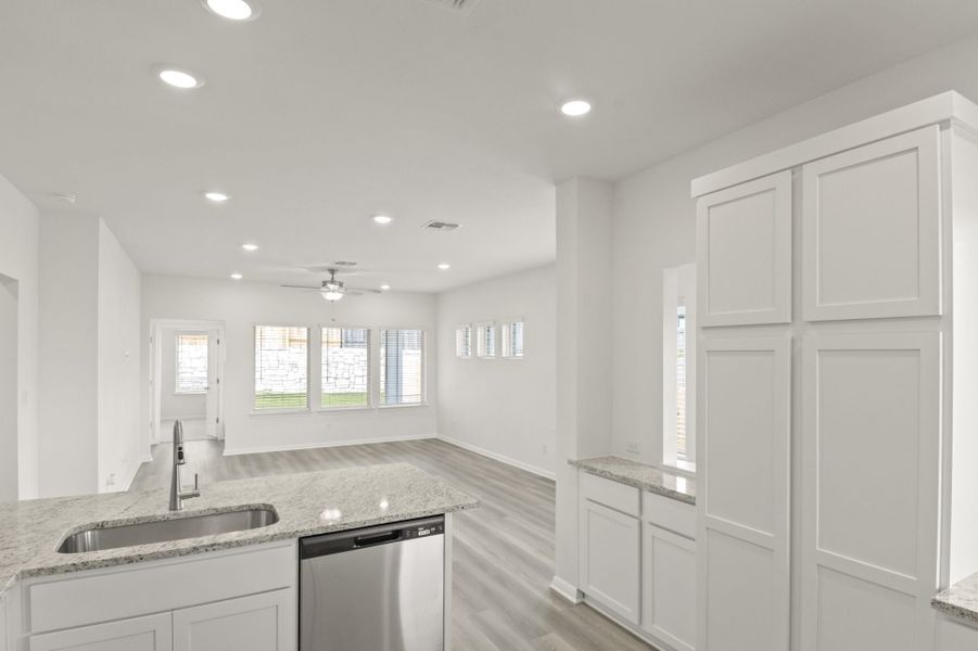 Furnished interior view inside a new home in Crosswinds, Kyle (Image 9).