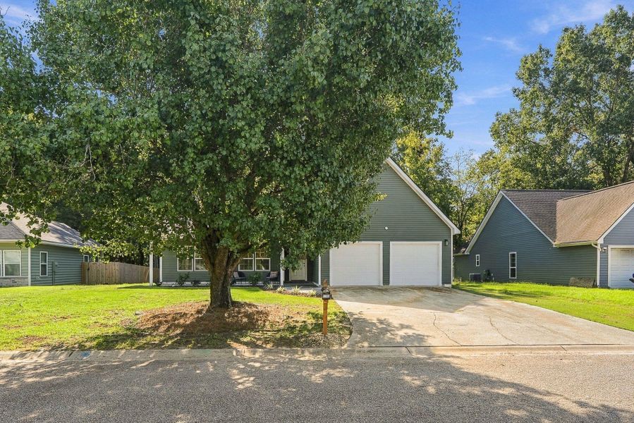 Front exterior of a new home in , North Charleston, SC, highlighting curb appeal (Image 2). Front exterior of a new home in , North Charleston, SC, highlighting curb appeal (Image 2).