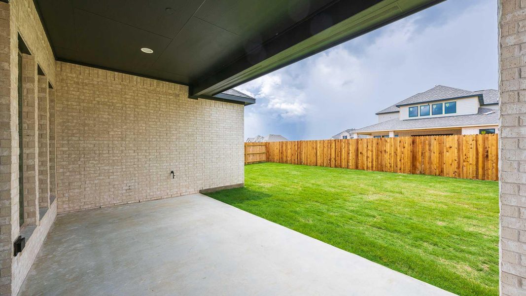 Exterior details and patio area of a home in Santa Rita Ranch - Tierra Rosa, Liberty Hill (Image 3). Exterior details and patio area of a home in Santa Rita Ranch - Tierra Rosa, Liberty Hill (Image 3).