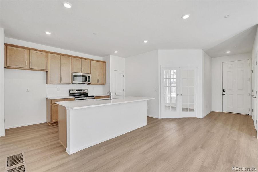 Furnished interior view inside a new home in Turnberry Villas, Commerce City (Image 12).