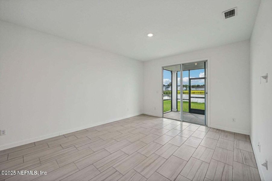 Spacious, unfurnished interior of a new home in Lakes at Bella Lago - Signature Series, Green Cove Springs (Image 30).