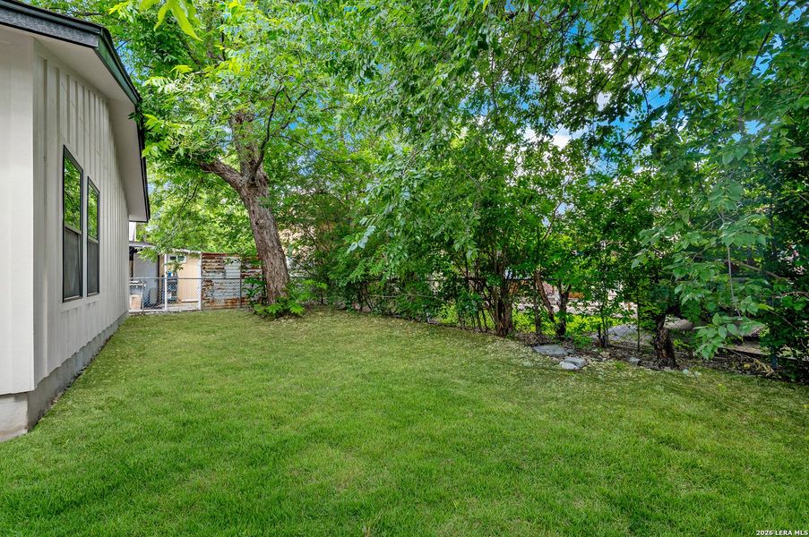 Exterior details and patio area of a home in , San Antonio (Image 25).