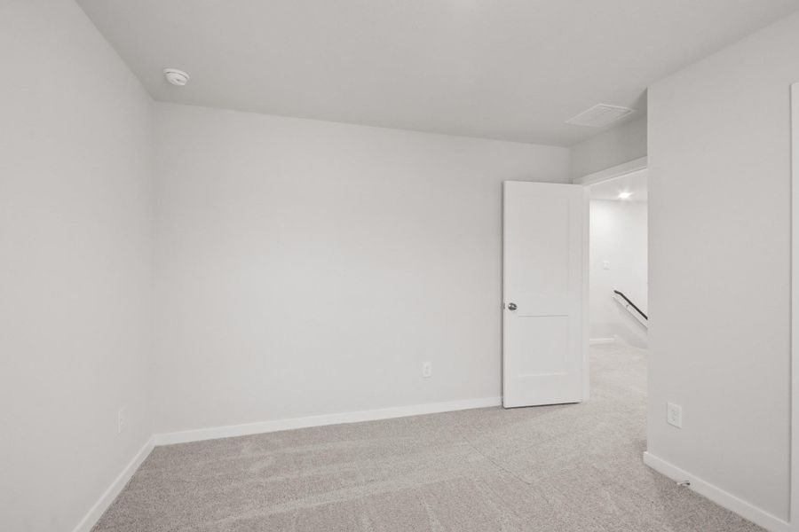 Spacious, unfurnished interior of a new home in Lakes at Black Oak, Magnolia (Image 16).