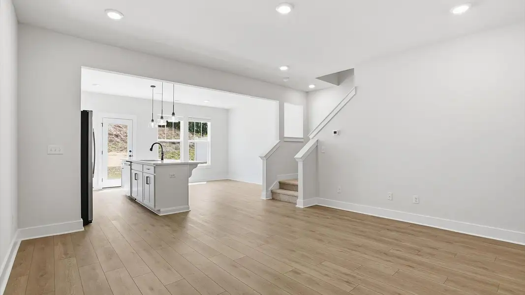 Highly functional family room with established charm and current styling in a reputable community in Greenville, SC