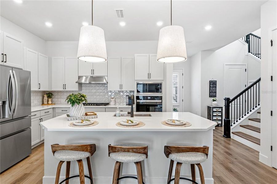 Furnished interior view inside a new home in Emerald Landing at Waterside at Lakewood Ranch – Cottage Series, Sarasota (Image 15). Furnished interior view inside a new home in Emerald Landing at Waterside at Lakewood Ranch – Cottage Series, Sarasota (Image 15).