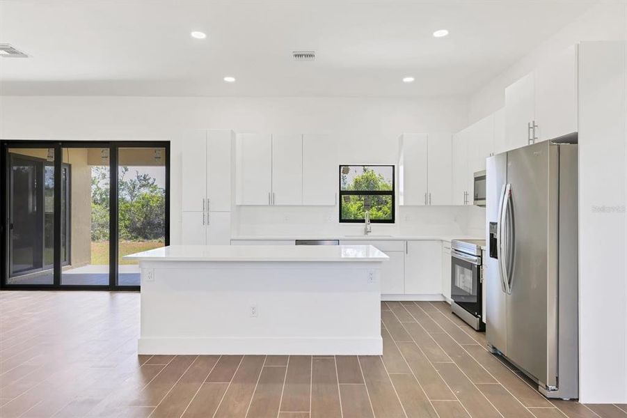 Furnished interior view inside a new home in , Port Charlotte (Image 9). Furnished interior view inside a new home in , Port Charlotte (Image 9).