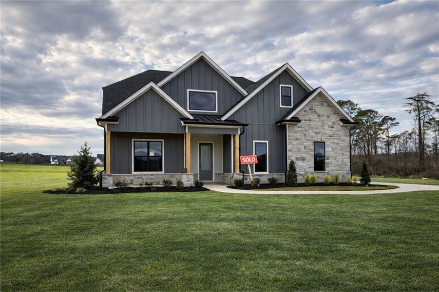 Front exterior of a new home in , Rydal, GA, highlighting curb appeal (Image 2). Front exterior of a new home in , Rydal, GA, highlighting curb appeal (Image 2).