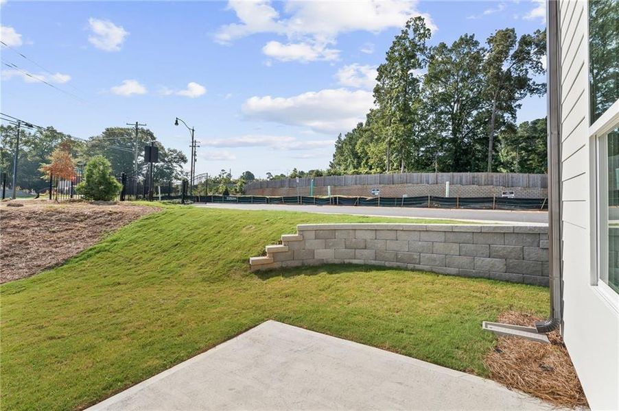 Exterior details and patio area of a home in The Village at Shallowford, Kennesaw (Image 4).