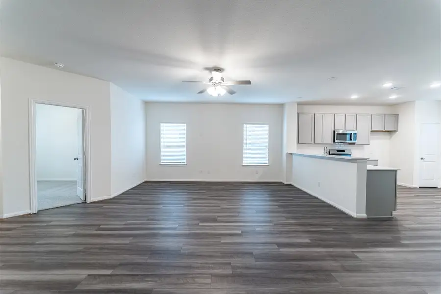 Spacious, unfurnished interior of a new home in Windrose Green, Angleton (Image 12).