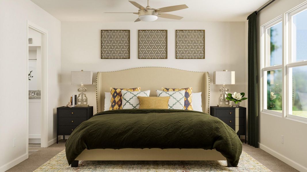 A bedroom with a large bed.