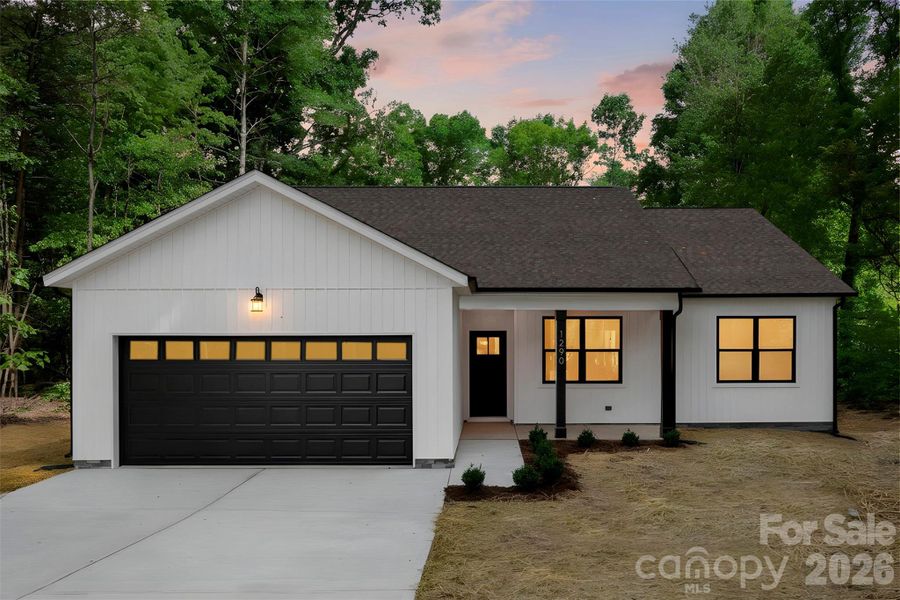 Front exterior of a new home in , Statesville, NC, highlighting curb appeal (Image 25).