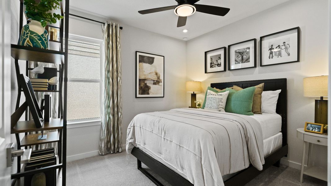 The Atlantic’s secondary bedroom offers comfort with stylish décor, natural light, and space for rest or study.