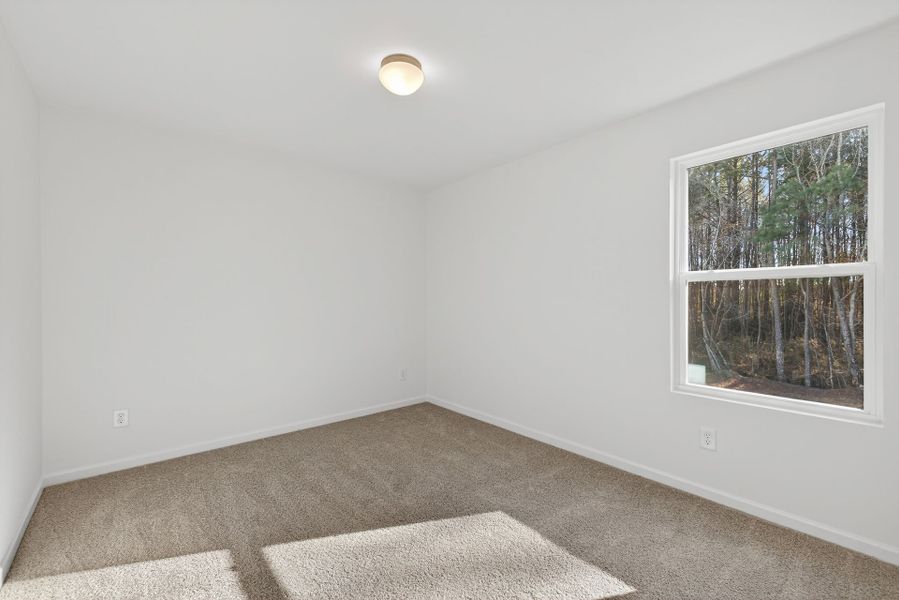 Spacious, unfurnished interior of a new home in Nathans Ridge, Lillington (Image 22).