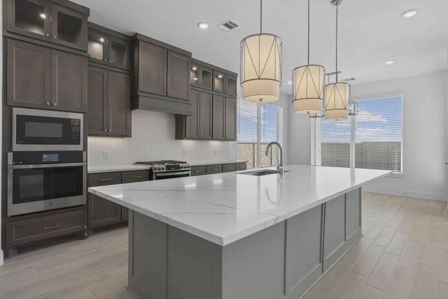 Representative furnished interior of a home built from the Waterford by Chesmar Homes in Meridiana 60's, Manvel (Image 10).