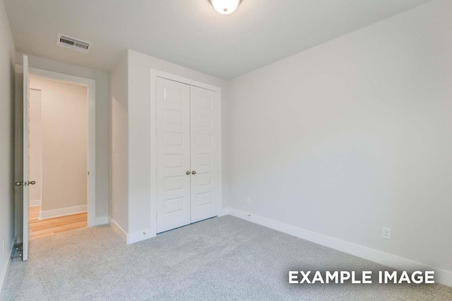 Spacious, unfurnished interior of a new home in Sunterra, Katy (Image 24).
