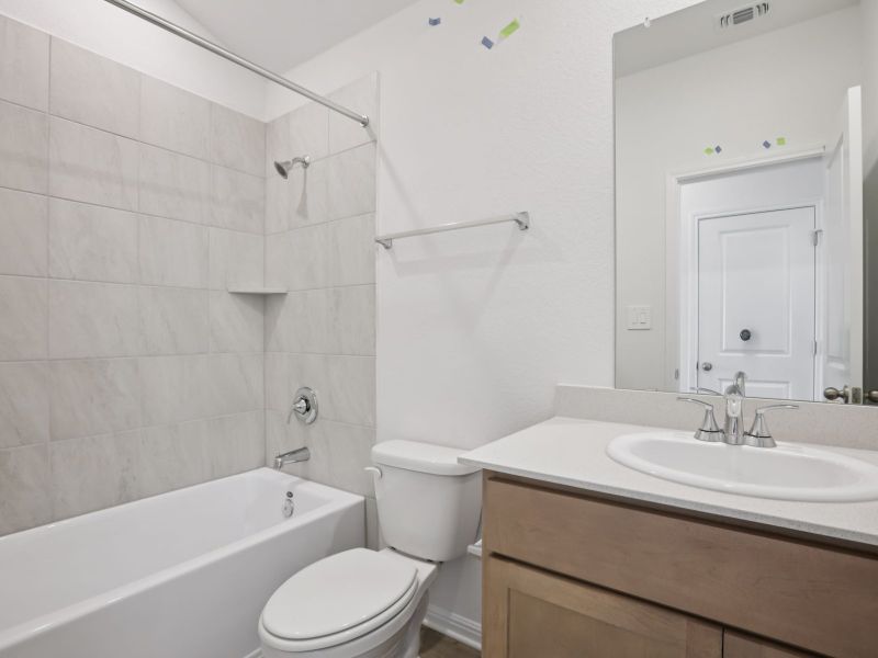 Furnished interior view inside a new home in Prairie Winds - Reserve Collection, Hutto (Image 7).