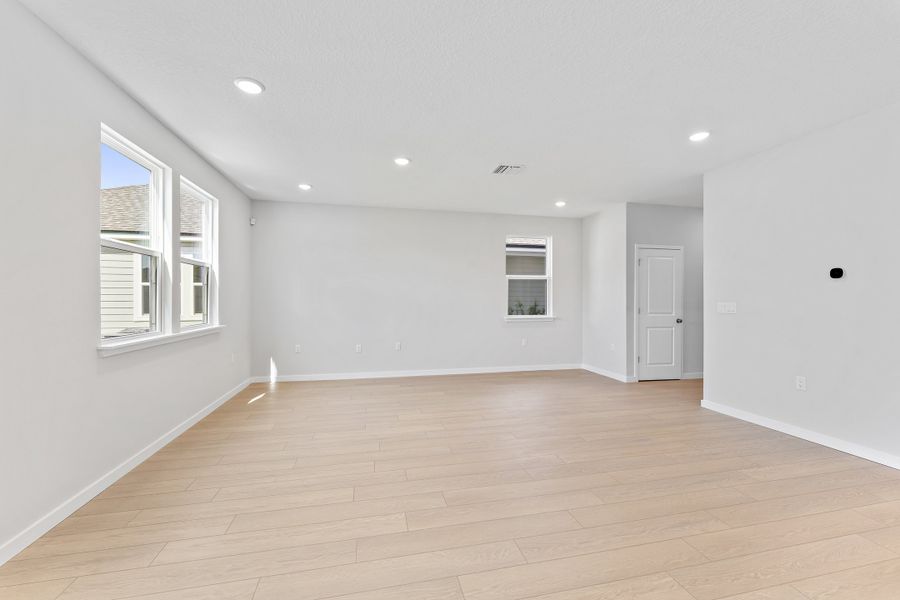 Lot 20 Ponderosa II Dining Area Overlooking Living Room at Camden Woods in Kingsland, GA