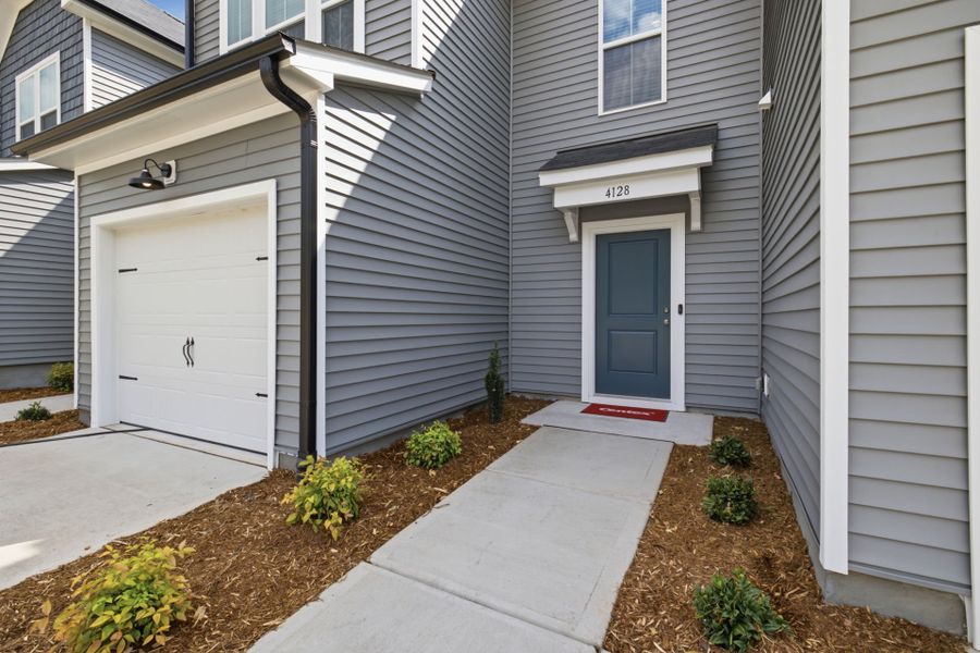Exterior details and patio area of a home in Carpenter Falls, Durham (Image 4). Exterior details and patio area of a home in Carpenter Falls, Durham (Image 4).