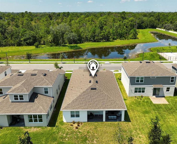 Front exterior of a new home in Savannah Palms, Orlando, FL, highlighting curb appeal (Image 18).