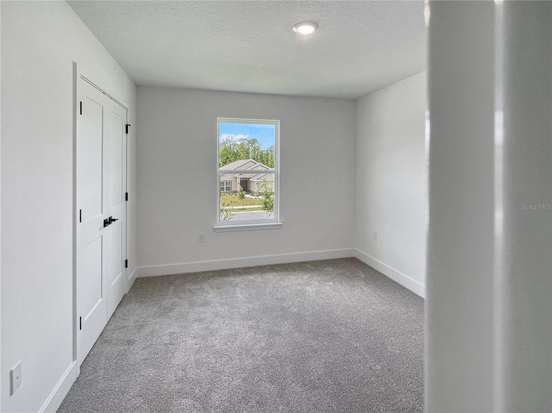 Spacious, unfurnished interior of a new home in Harmony Central, St. Cloud (Image 16).