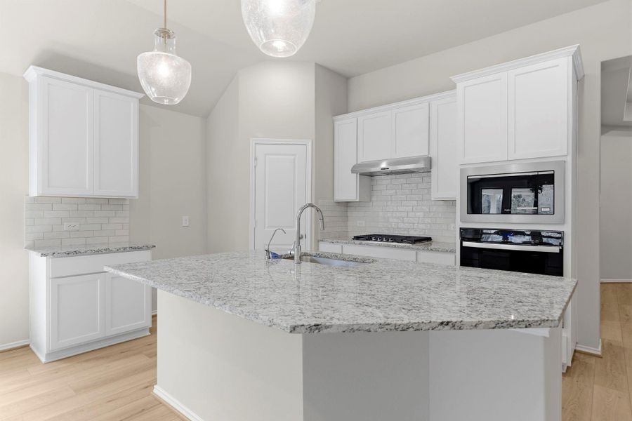 Furnished interior view inside a new home in Grand Central Park, Conroe (Image 9).