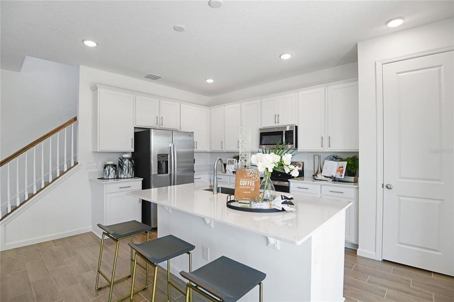 Furnished interior view inside a new home in Seaport Village, Tavares (Image 13).