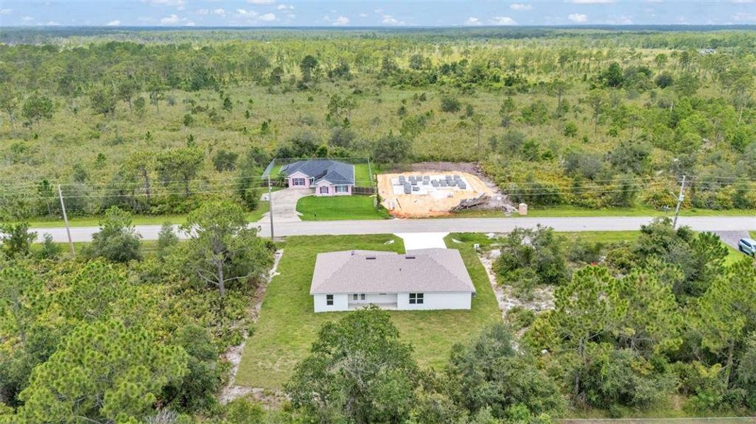 Front exterior of a new home in , Sebring, FL, highlighting curb appeal (Image 31).