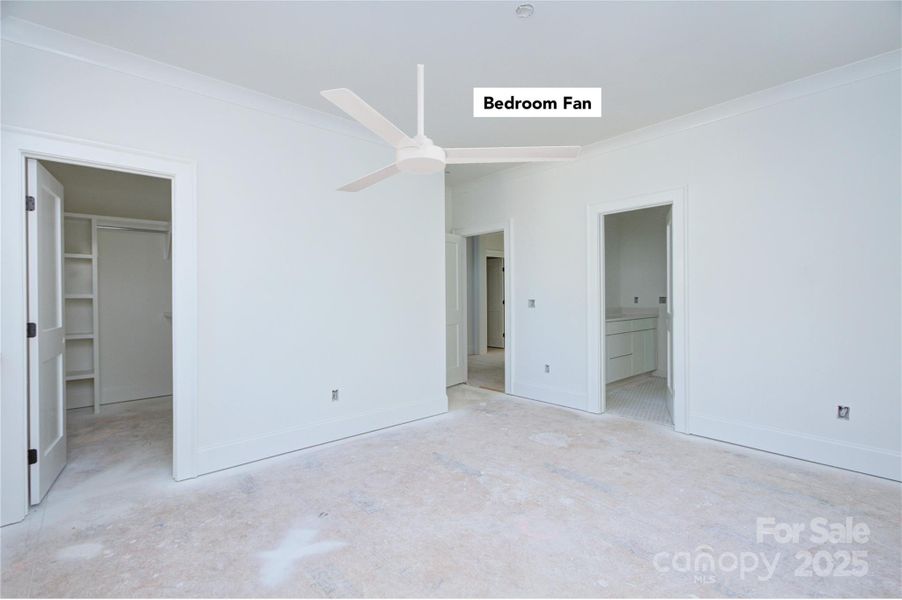 Bedroom with en suite bathroom and walk in closet. Carpet to be installed Bedroom with en suite bathroom and walk in closet. Carpet to be installed