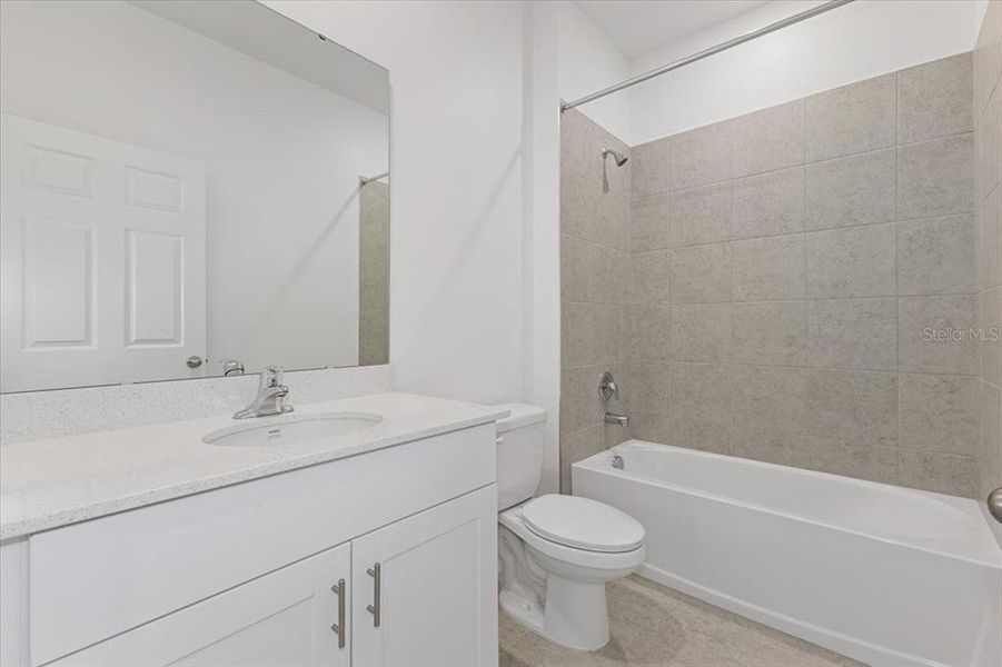 Furnished interior view inside a new home in Highfield at Twisted Oaks, Wildwood (Image 2).