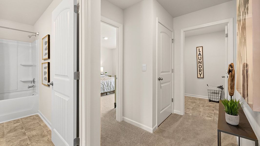 Representative furnished interior of a home built from the Penwell by D.R. Horton in Oakleigh Glen, Dallas (Image 17).