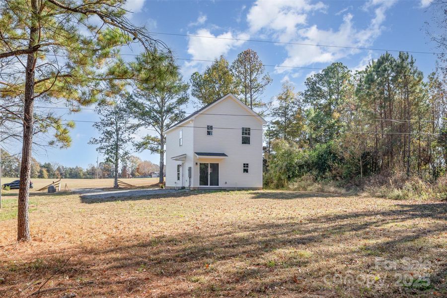 Room to roam! The large backyard offers endless possibilities for gardening, entertaining, or simply enjoying the Carolina sunshine. Room to roam! The large backyard offers endless possibilities for gardening, entertaining, or simply enjoying the Carolina sunshine.