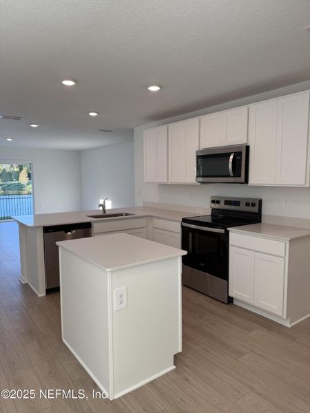 Furnished interior view inside a new home in Trout River, Jacksonville (Image 5).